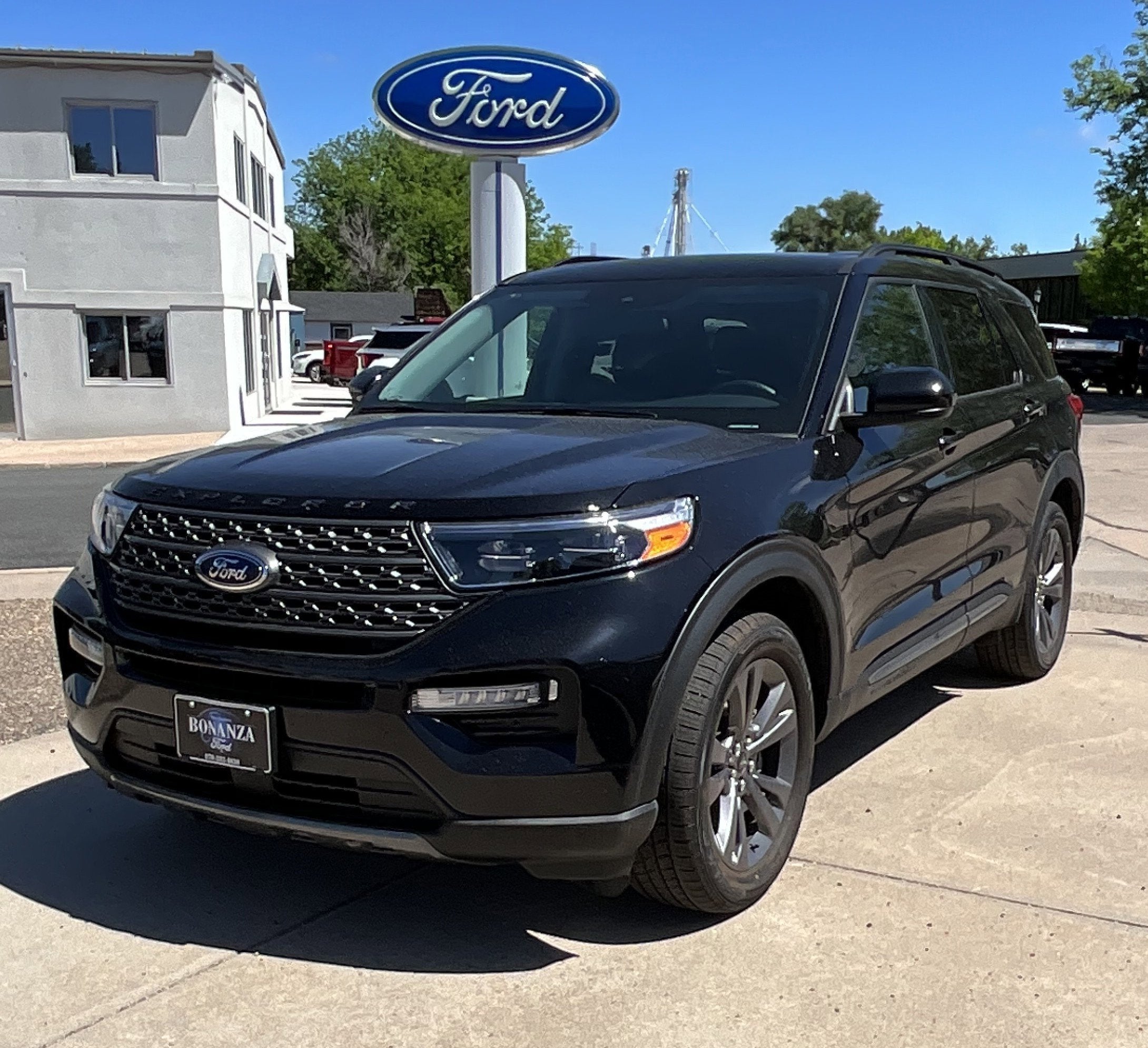 2024 Ford Explorer XLT in Agate Black Metallic — front three-quarter view