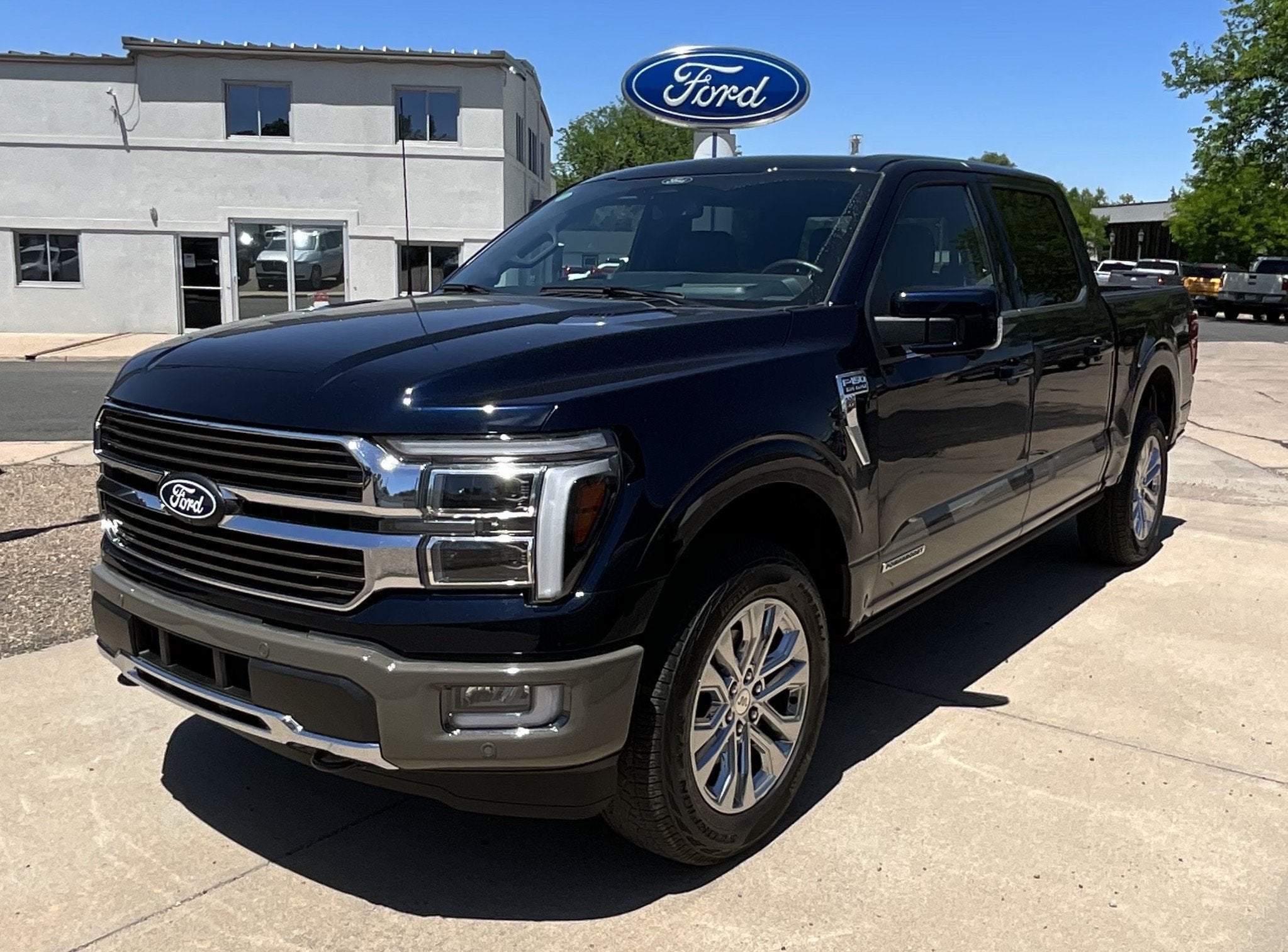 2025 Ford F-150 King Ranch in Antimatter Blue Metallic — front three-quarter view